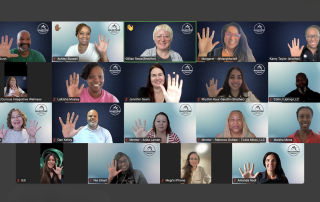 Image of a class full of smiling Milestone Circles participants celebrating 5 years of this incredible progam