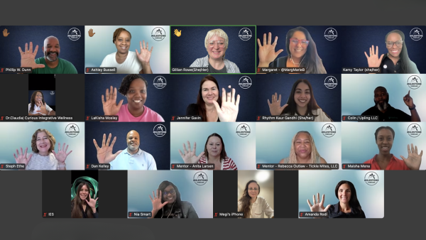Image of a class full of smiling Milestone Circles participants celebrating 5 years of this incredible progam